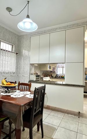 Casa à venda com 107m², 3 quartos e 2 vagas Casa à venda com 107m², 3 quartos e 2 vagasCozinha