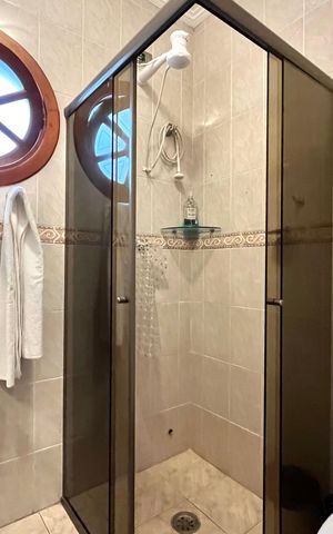 Casa à venda com 107m², 3 quartos e 2 vagas Casa à venda com 107m², 3 quartos e 2 vagasBanheiro Corredor