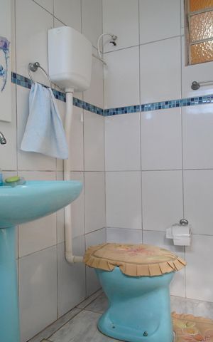 Casa à venda com 837m², 3 quartos e 2 vagasBanheiro da área gourmet