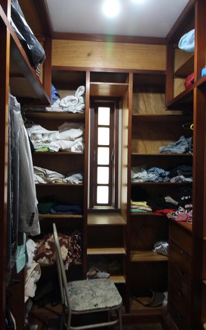 Casa de condomínio à venda com 724m², 4 quartos e 3 vagasCloset da suíte 2