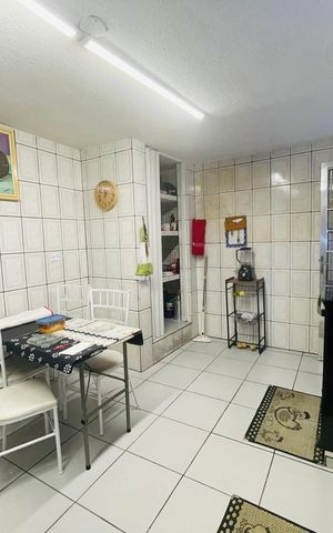 Casa à venda com 125m², 2 quartos e 2 vagas Casa à venda com 125m², 2 quartos e 2 vagasCozinha