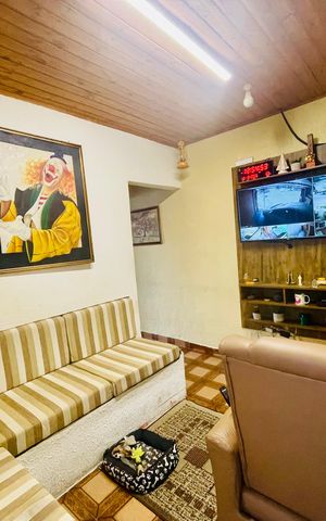 Casa à venda com 125m², 2 quartos e 2 vagas Casa à venda com 125m², 2 quartos e 2 vagasSala