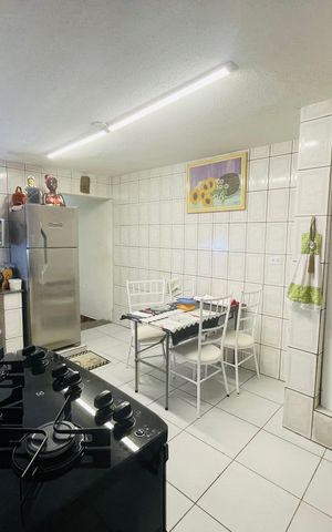 Casa à venda com 125m², 2 quartos e 2 vagas Casa à venda com 125m², 2 quartos e 2 vagasCozinha