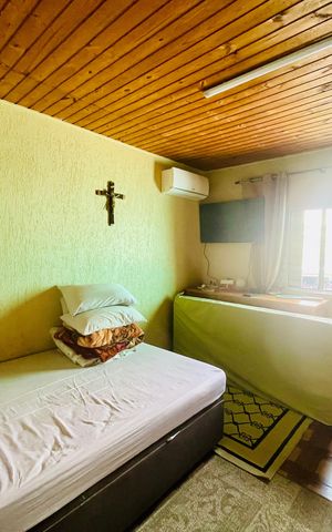 Casa à venda com 125m², 2 quartos e 2 vagas Casa à venda com 125m², 2 quartos e 2 vagasQuarto 1