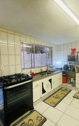 Casa à venda com 125m², 2 quartos e 2 vagas Casa à venda com 125m², 2 quartos e 2 vagasCozinha