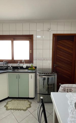 Casa à venda com 235m², 3 quartos e 5 vagas Casa à venda com 235m², 3 quartos e 5 vagasCozinha