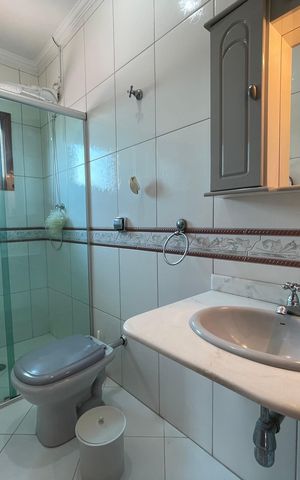 Casa à venda com 235m², 3 quartos e 5 vagas Casa à venda com 235m², 3 quartos e 5 vagasBanheiro da Suíte 3