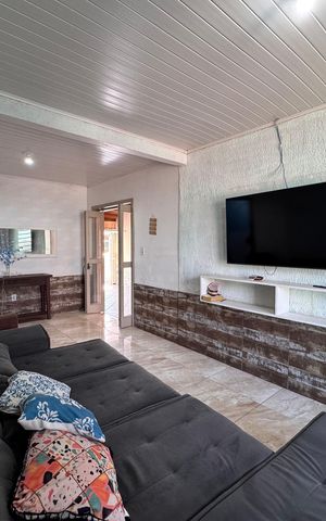 Casa à venda com 110m², 3 quartos e 2 vagasSala