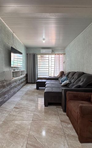 Casa à venda com 110m², 3 quartos e 2 vagasSala