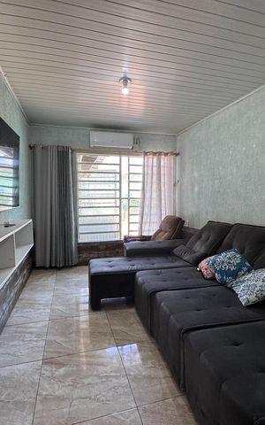 Casa à venda com 110m², 3 quartos e 2 vagasSala