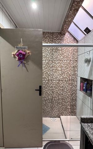 Casa à venda com 110m², 3 quartos e 2 vagasBanheiro