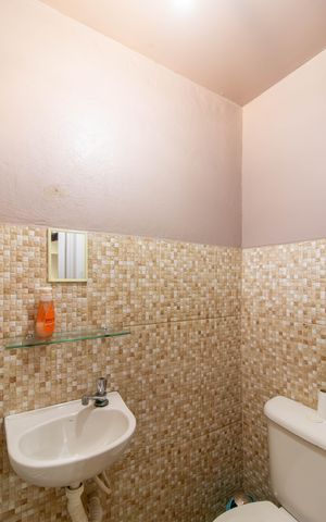 Casa à venda com 179m², 3 quartos e 4 vagas Casa à venda com 179m², 3 quartos e 4 vagasLavabo da Area Gourmet