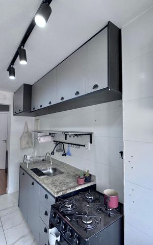 Apartamento à venda com 54m², 2 quartos e 1 vaga Apartamento à venda com 54m², 2 quartos e 1 vagaCozinha e Área de Serviço