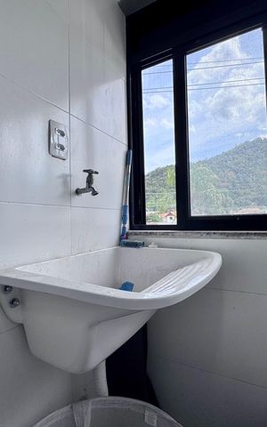 Apartamento à venda com 54m², 2 quartos e 1 vaga Apartamento à venda com 54m², 2 quartos e 1 vagaCozinha e Área de Serviço