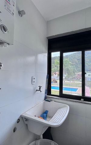 Apartamento à venda com 54m², 2 quartos e 1 vaga Apartamento à venda com 54m², 2 quartos e 1 vagaCozinha e Área de Serviço