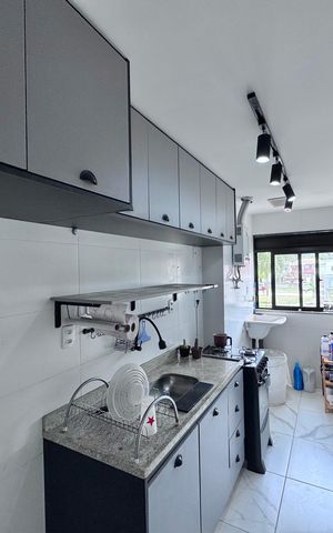 Apartamento à venda com 54m², 2 quartos e 1 vaga Apartamento à venda com 54m², 2 quartos e 1 vagaCozinha e Área de Serviço