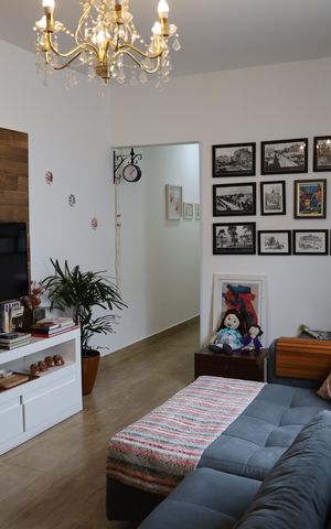 Casa à venda com 98m², 3 quartos e 2 vagasSala