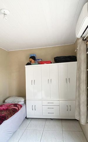 Casa à venda com 105m², 3 quartos e 1 vagaQuarto 1