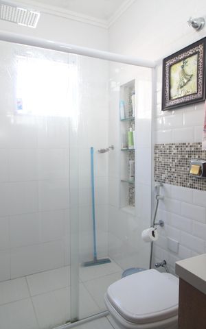 Casa à venda com 125m², 3 quartos e 2 vagasBanheiro da Suite 1