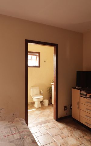 Casa à venda com 228m², 3 quartos e 4 vagasSuíte