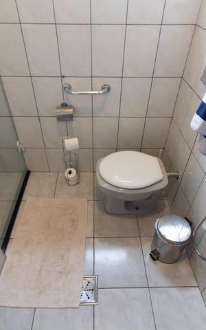 Casa à venda com 250m², 3 quartos e 3 vagas Casa à venda com 250m², 3 quartos e 3 vagasBanheiro