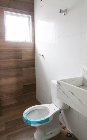 Casa à venda com 120m², 3 quartos e 2 vagas Casa à venda com 120m², 3 quartos e 2 vagasBanheiro 2