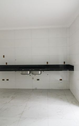 Casa à venda com 120m², 3 quartos e 2 vagas Casa à venda com 120m², 3 quartos e 2 vagasCozinha