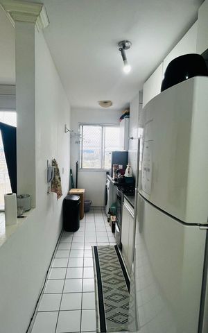 Apartamento à venda com 48m², 2 quartos e 1 vaga Apartamento à venda com 48m², 2 quartos e 1 vagaCozinha e Área de Serviço