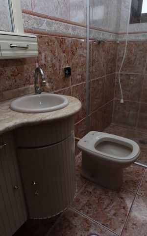 Casa à venda com 195m², 3 quartos e 2 vagasBanheiro Social 1