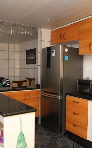 Casa de condomínio para alugar com 185m², 3 quartos e 2 vagasCozinha