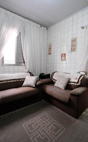 Casa à venda com 100m², 2 quartos e 2 vagasSala
