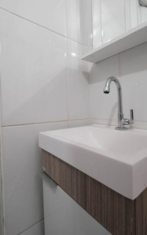 Casa à venda com 100m², 2 quartos e 2 vagasBanheiro 1
