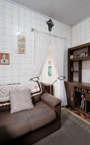 Casa à venda com 100m², 2 quartos e 2 vagasSala