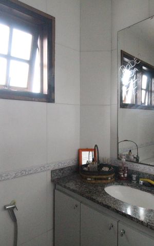 Casa de condomínio à venda com 121m², 3 quartos e 2 vagasBanheiro da suíte