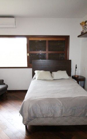 Casa de condomínio para alugar com 450m², 4 quartos e 6 vagasSuíte 3
