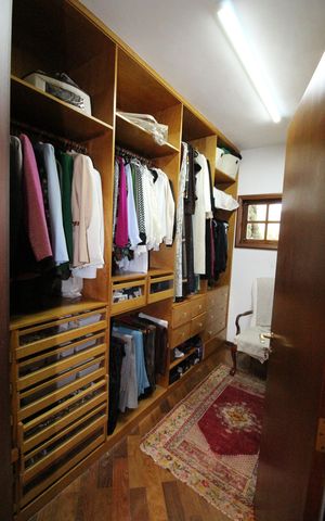Casa de condomínio para alugar com 450m², 4 quartos e 6 vagasCloset da Suíte 1
