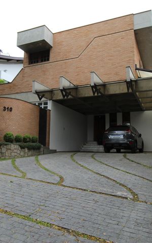 Casa de condomínio para alugar com 450m², 4 quartos e 6 vagasFachada da Casa