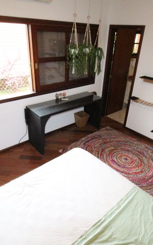 Casa de condomínio para alugar com 450m², 4 quartos e 6 vagasSuíte 2