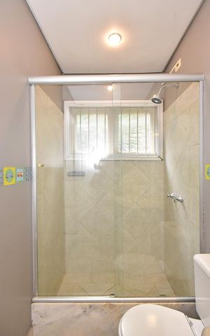 Casa à venda com 271m², 3 quartos e 4 vagasBanheiro Suíte 2