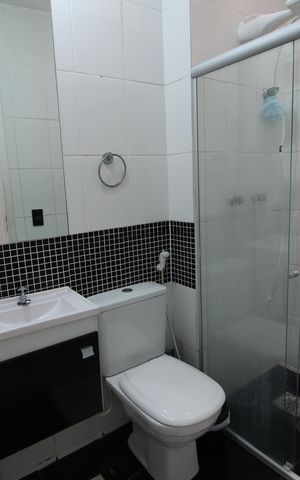 Casa de condomínio à venda com 70m², 2 quartos e 1 vagaBanheiro Social