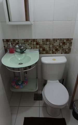 Casa de condomínio à venda com 70m², 2 quartos e 1 vagaLavabo