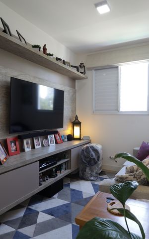 Apartamento à venda com 64m², 2 quartos e 1 vagaSala de TV