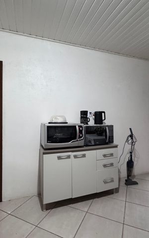 Casa à venda com 120m², 2 quartos e 2 vagas Casa à venda com 120m², 2 quartos e 2 vagasCozinha