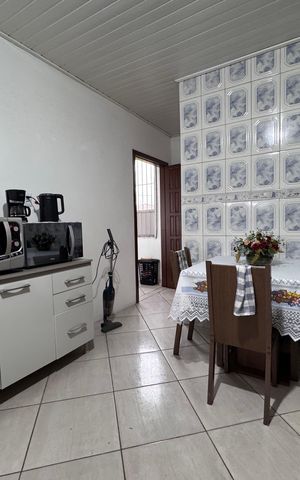 Casa à venda com 120m², 2 quartos e 2 vagas Casa à venda com 120m², 2 quartos e 2 vagasCozinha