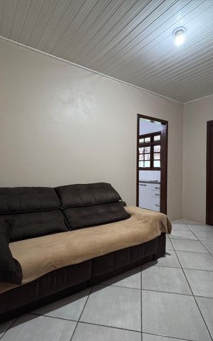 Casa à venda com 120m², 2 quartos e 2 vagas Casa à venda com 120m², 2 quartos e 2 vagasSala