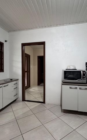 Casa à venda com 120m², 2 quartos e 2 vagas Casa à venda com 120m², 2 quartos e 2 vagasCozinha