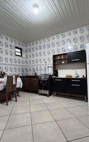 Casa à venda com 120m², 2 quartos e 2 vagas Casa à venda com 120m², 2 quartos e 2 vagasCozinha