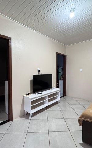 Casa à venda com 120m², 2 quartos e 2 vagas Casa à venda com 120m², 2 quartos e 2 vagasSala