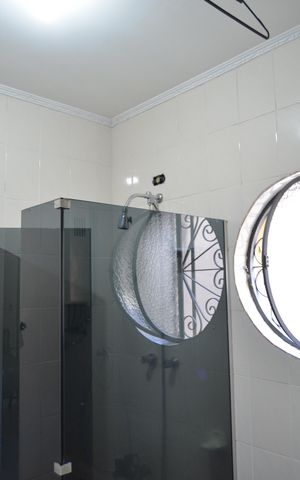 Casa à venda com 323m², 3 quartos e 4 vagasBanheiro da Suíte