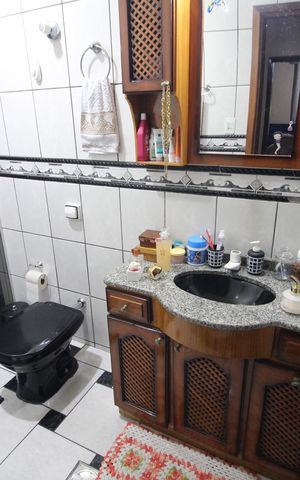 Casa à venda com 511m², 4 quartos e 4 vagasBanheiro da Suíte